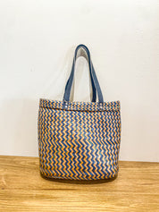 Bag with leather handle