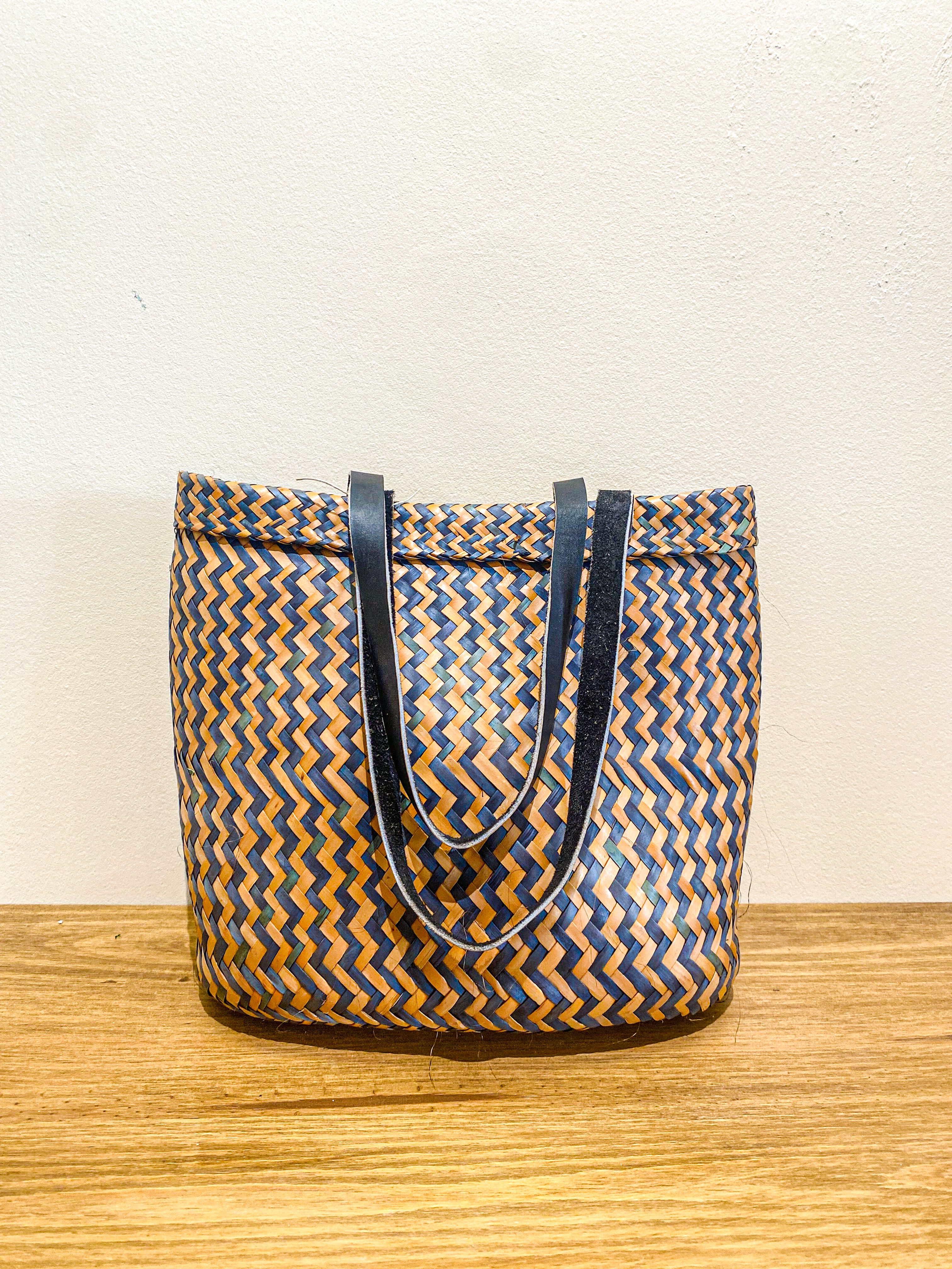 Bag with leather handle