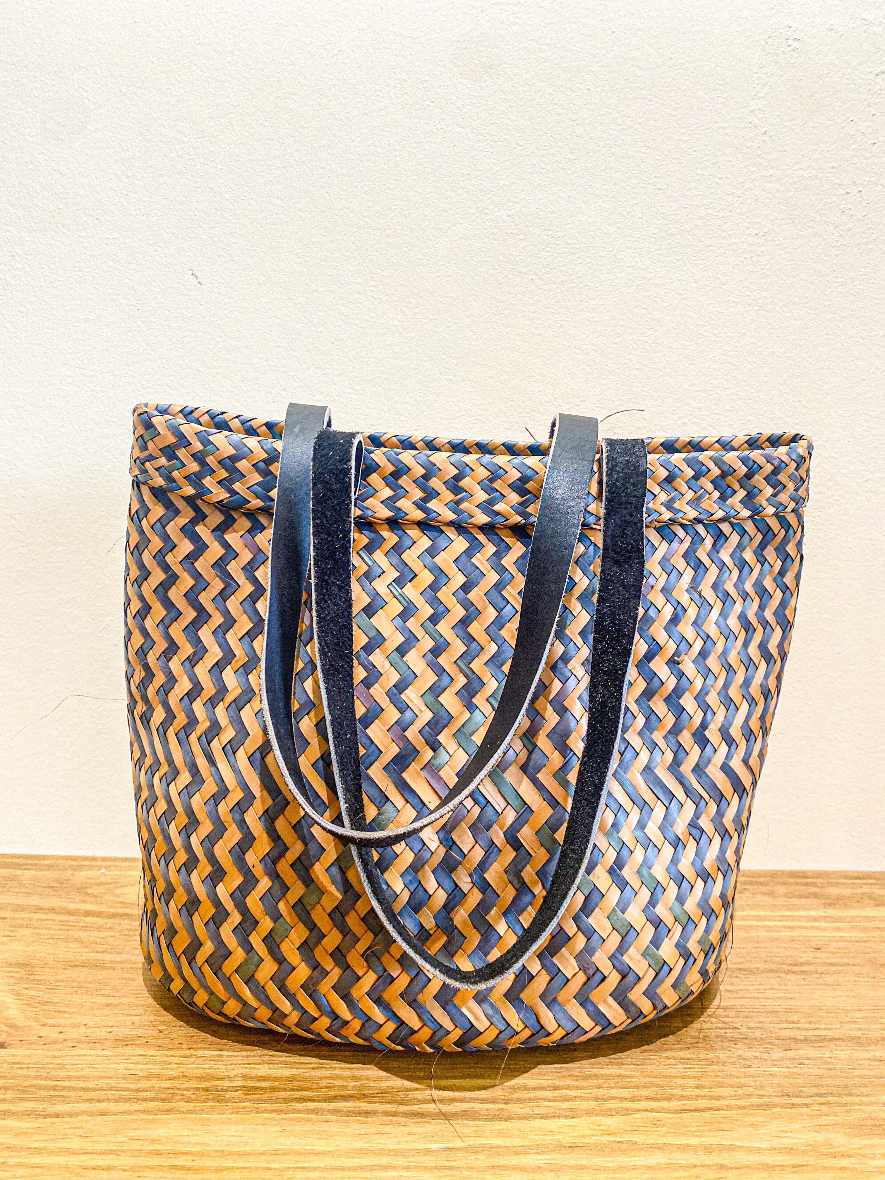 Bag with leather handle